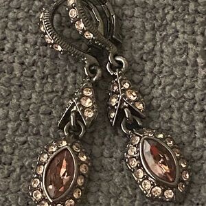 One pair of pink vintage rhinestone earrings “by Givenchy”
